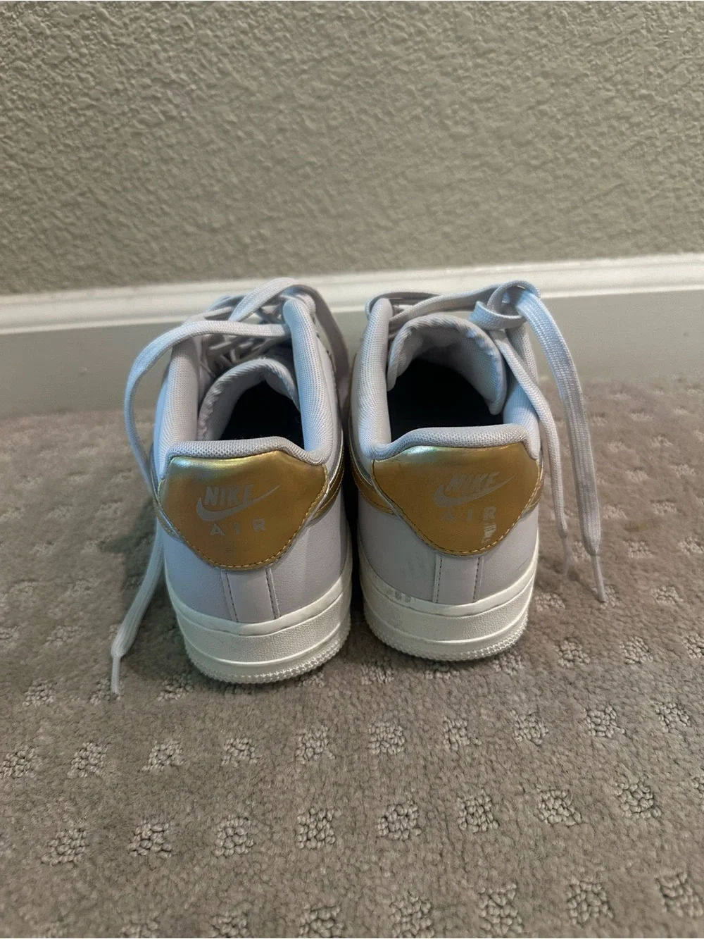 Nike Wonen White Sneakers with Gold Swoosh